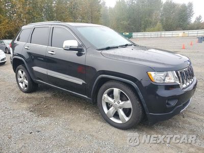 Czwarte zdjęcie samochodu z boku: 2011 JEEP GRAND CHEROKEE OVERLAND VIN:1J4RR6GT7BC569844 - miniatura