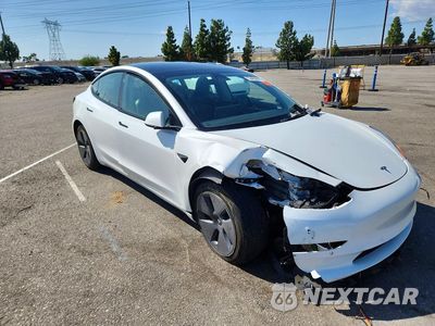 Czwarte zdjęcie samochodu z boku: 2022 TESLA MODEL 3 VIN:5YJ3E1EA6NF342566 - miniatura