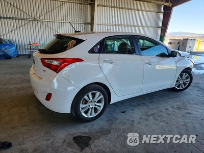 Trzecie zdjęcie samochodu z tyłu: 2014 HYUNDAI ELANTRA GT BASE VIN:KMHD35LH4EU186094 - miniatura