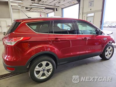 Trzecie zdjęcie samochodu z tyłu: 2014 FORD ESCAPE SE VIN:1FMCU9G92EUB01904 - miniatura