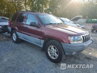 Czwarte zdjęcie samochodu z boku: 1999 JEEP GRAND CHEROKEE LAREDO VIN:1J4GW58S3XC609781 - miniatura