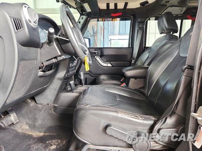 Zdjęcie 7 z 12 samochodu: 2015 JEEP WRANGLER UNLIMITED SAHARA VIN:1C4BJWEG4FL630318 - miniatura