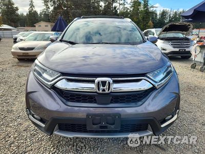 Piąte zdjęcie samochodu w środku: 2017 HONDA CR-V TOURING VIN:2HKRW2H91HH612484 - miniatura