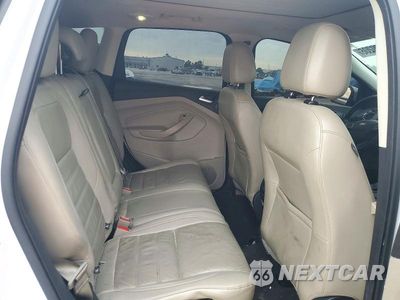 Zdjęcie 11 z 14 samochodu: 2017 FORD ESCAPE TITANIUM VIN:1FMCU0J94HUA45750 - miniatura