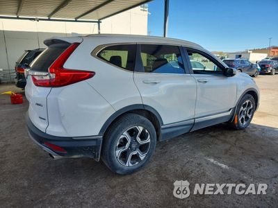 Trzecie zdjęcie samochodu z tyłu: 2019 HONDA CR-V TOURING VIN:5J6RW2H9XKL011202 - miniatura
