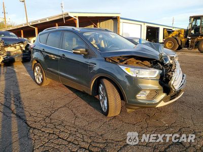 Czwarte zdjęcie samochodu z boku: 2019 FORD ESCAPE TITANIUM VIN:1FMCU9J95KUC53731 - miniatura