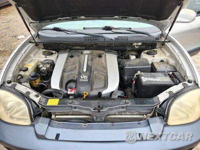 Zdjęcie 12 z 13 samochodu: 2004 HYUNDAI SANTA FE GLS VIN:KM8SC73E24U584959 - miniatura