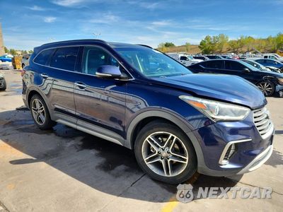 Czwarte zdjęcie samochodu z boku: 2017 HYUNDAI SANTA FE LIMITED ULTIMATE VIN:KM8SRDHF3HU168584 - miniatura