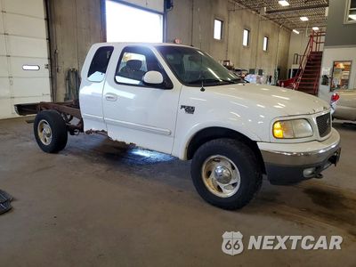 Czwarte zdjęcie samochodu z boku: 2001 FORD F150 VIN:2FTRX18L01CA54464 - miniatura