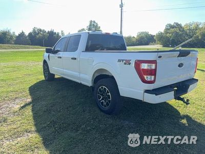 Trzecie zdjęcie samochodu z tyłu: 2023 FORD F150 SUPERCREW VIN:1FTFW1E51PKD13592 - miniatura