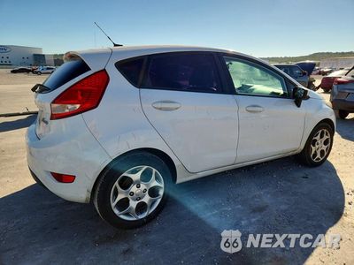 Trzecie zdjęcie samochodu z tyłu: 2011 FORD FIESTA SE VIN:3FADP4EJ8BM162325 - miniatura