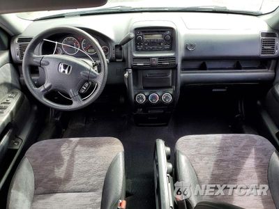 Zdjęcie 8 z 12 samochodu: 2004 HONDA CR-V LX VIN:JHLRD68454C010228 - miniatura