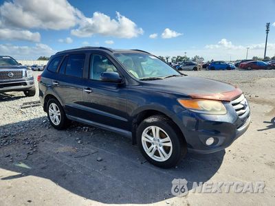 Czwarte zdjęcie samochodu z boku: 2012 HYUNDAI SANTA FE LIMITED VIN:5XYZKDAG9CG103498 - miniatura