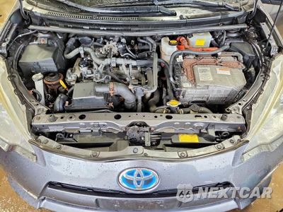 Zdjęcie 11 z 12 samochodu: 2014 TOYOTA PRIUS C TWO VIN:JTDKDTB3XE1068443 - miniatura