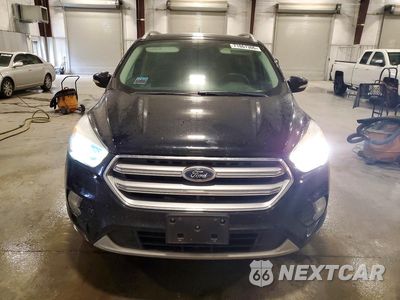 Piąte zdjęcie samochodu w środku: 2017 FORD ESCAPE TITANIUM VIN:1FMCU9J95HUA14625 - miniatura
