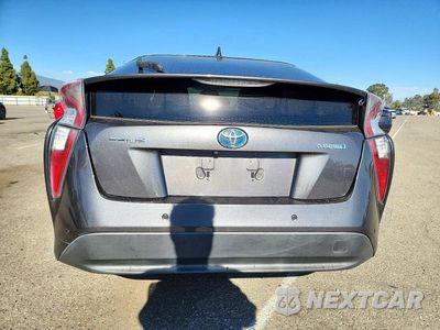 Zdjęcie 6 z 12 samochodu: 2017 TOYOTA PRIUS TWO VIN:JTDKBRFU0H3575338 - miniatura