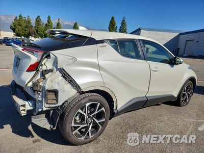 Trzecie zdjęcie samochodu z tyłu: 2019 TOYOTA C-HR XLE VIN:JTNKHMBX4K1053425 - miniatura