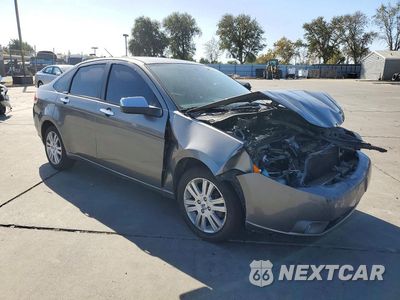 Czwarte zdjęcie samochodu z boku: 2010 FORD FOCUS SEL VIN:1FAHP3HN1AW235642 - miniatura