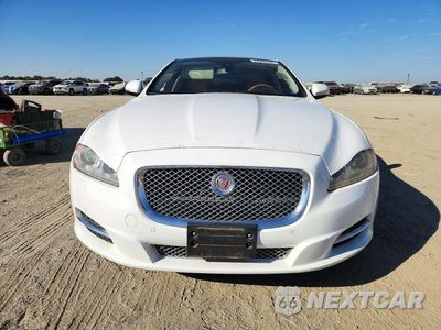 Piąte zdjęcie samochodu w środku: 2014 JAGUAR XJL PORTFOLIO VIN:SAJWA2GZ5E8V65264 - miniatura