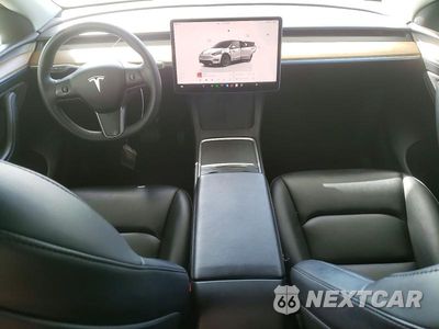 Zdjęcie 8 z 12 samochodu: 2023 TESLA MODEL Y VIN:7SAYGDEE5PF632470 - miniatura