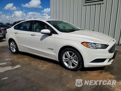 Czwarte zdjęcie samochodu z boku: 2018 FORD FUSION SE HYBRID VIN:3FA6P0LUXJR140827 - miniatura