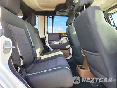 Zdjęcie 11 z 13 samochodu: 2012 JEEP WRANGLER UNLIMITED SAHARA VIN:1C4BJWEG6CL205341 - miniatura