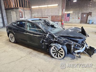 Czwarte zdjęcie samochodu z boku: 2022 TESLA MODEL 3 VIN:5YJ3E1EB9NF290603 - miniatura