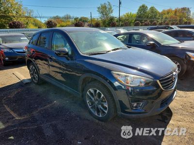 Czwarte zdjęcie samochodu z boku: 2016 MAZDA CX-5 GT VIN:JM3KE4DY5G0743742 - miniatura