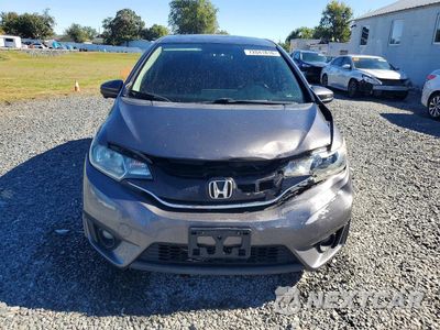 Piąte zdjęcie samochodu w środku: 2016 HONDA FIT EX VIN:JHMGK5H7XGX032543 - miniatura