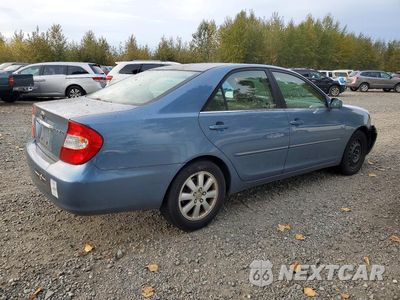 Trzecie zdjęcie samochodu z tyłu: 2003 TOYOTA CAMRY XLE VIN:JTDBE30K030176869 - miniatura