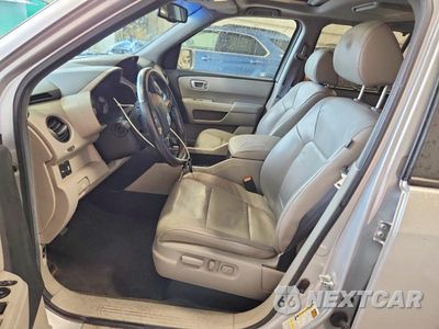Zdjęcie 7 z 13 samochodu: 2012 HONDA PILOT TOURING VIN:5FNYF4H9XCB079839 - miniatura