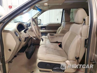Zdjęcie 7 z 12 samochodu: 2004 FORD F150 VIN:1FTVX14574NB64674 - miniatura