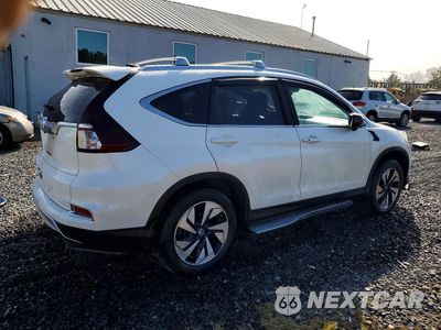 Trzecie zdjęcie samochodu z tyłu: 2016 HONDA CR-V TOURING VIN:5J6RM4H96GL130227 - miniatura