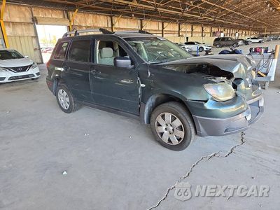 Czwarte zdjęcie samochodu z boku: 2004 MITSUBISHI OUTLANDER LS VIN:JA4LX31F54U052391 - miniatura