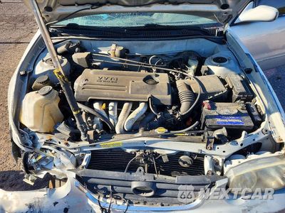Zdjęcie 11 z 12 samochodu: 2002 TOYOTA COROLLA LE VIN:2T1BR12E92C564395 - miniatura