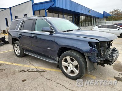 Czwarte zdjęcie samochodu z boku: 2018 CHEVROLET TAHOE K1500 LS VIN:1GNSKAKC0JR303834 - miniatura