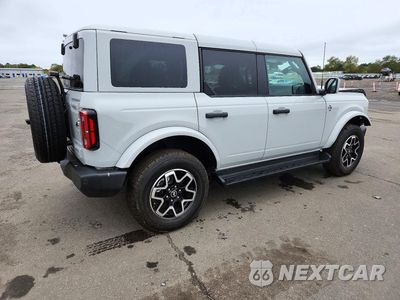 Trzecie zdjęcie samochodu z tyłu: 2026 FORD BRONCO OUTER BANKS VIN:1FMDE8BH1TLB04760 - miniatura