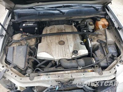 Zdjęcie 11 z 12 samochodu: 2006 CADILLAC SRX VIN:1GYEE63A560135122 - miniatura