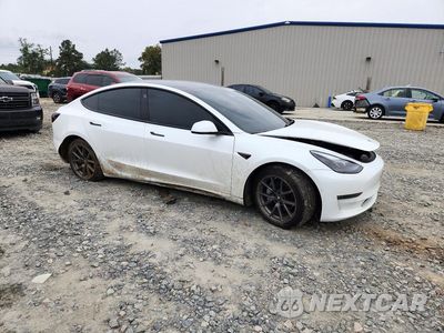 Czwarte zdjęcie samochodu z boku: 2022 TESLA MODEL 3 VIN:5YJ3E1EA6NF325878 - miniatura