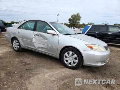 Czwarte zdjęcie samochodu z boku: 2002 TOYOTA CAMRY XLE VIN:4T1BE32K62U634270 - miniatura