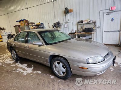 Czwarte zdjęcie samochodu z boku: 1999 CHEVROLET LUMINA LTZ VIN:2G1WN52K0X9122051 - miniatura