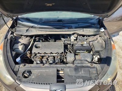Zdjęcie 12 z 13 samochodu: 2012 HYUNDAI TUCSON VIN:KM8JU3ACXCU388740 - miniatura