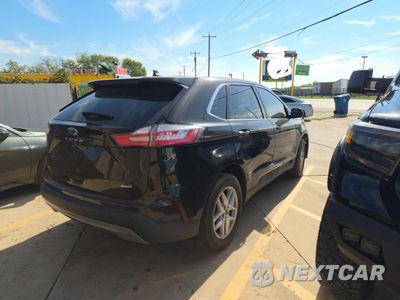 Czwarte zdjęcie samochodu z boku: 2023 FORD EDGE SEL VIN:2FMPK4J97PBA47656 - miniatura