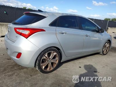Trzecie zdjęcie samochodu z tyłu: 2014 HYUNDAI ELANTRA GT BASE VIN:KMHD35LH7EU165031 - miniatura