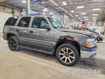 Czwarte zdjęcie samochodu z boku: 2002 CHEVROLET TAHOE K1500 VIN:1GNEK13ZX2J220136 - miniatura