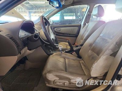 Zdjęcie 7 z 12 samochodu: 2002 NISSAN MAXIMA VIN:JN1DA31D52T410444 - miniatura