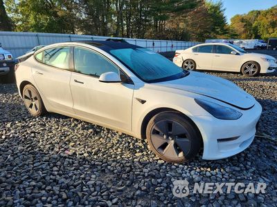 Czwarte zdjęcie samochodu z boku: 2023 TESLA MODEL 3 VIN:5YJ3E1EAXPF396214 - miniatura