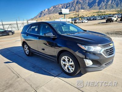 Czwarte zdjęcie samochodu z boku: 2018 CHEVROLET EQUINOX LT VIN:2GNAXJEV0J6307632 - miniatura