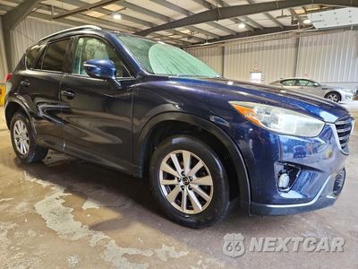 Czwarte zdjęcie samochodu z boku: 2016 MAZDA CX-5 TOURING VIN:JM3KE4CY3G0887100 - miniatura