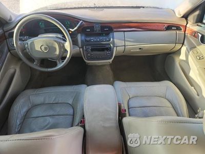 Zdjęcie 8 z 12 samochodu: 2004 CADILLAC DEVILLE VIN:1G6KD54Y34U224438 - miniatura